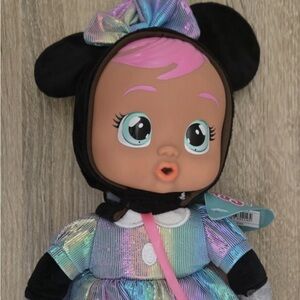 Disney Cry Babies Tiny Cuddles Doll with Multicolor Outfit and Pink Accessory